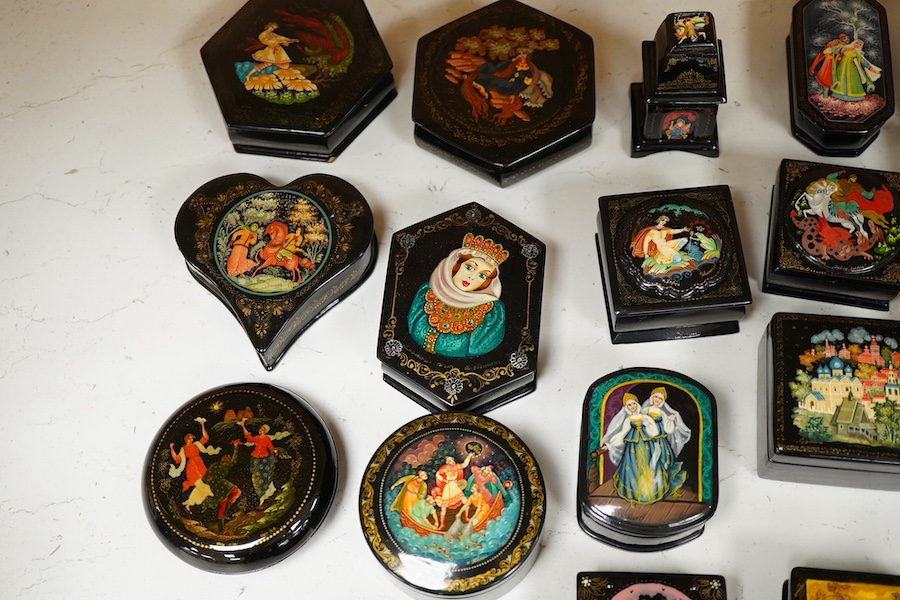 Twenty five Russian assorted lacquer pill and trinket boxes. Largest 10cm deep.